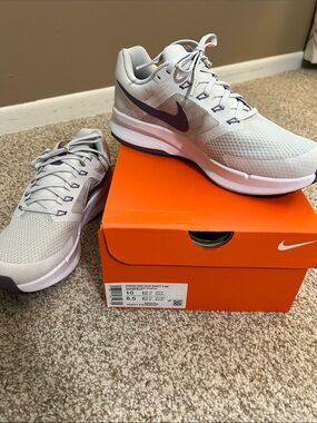 Nike Light Gray Athletic Shoes with Dark Swoosh